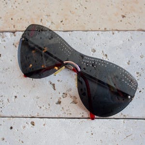 Valentino oversize design black lenses rimless butterfly sunglasses mod. 5140 with rhinestones details and silver metal frame made in Italy