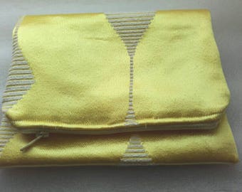 Yellow luxury zipper pouch makeup bag.  Foldover.