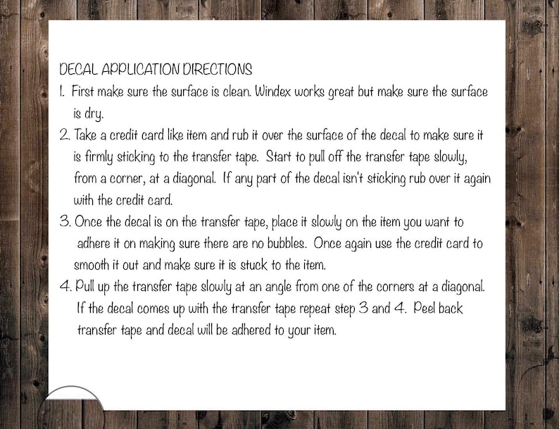 May include: Decal application directions with four steps for applying a decal to a surface. The instructions include using a credit card to smooth out the decal and remove air bubbles.