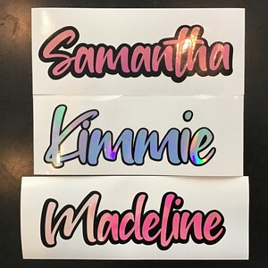 May include: Three white labels with names written in black and pink holographic lettering. The names are Samantha, Kimmie, and Madeline.