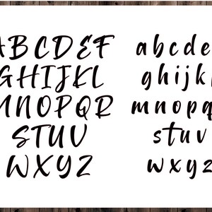 May include: A black and white image of the alphabet in uppercase and lowercase letters. The letters are written in a handwritten style font.