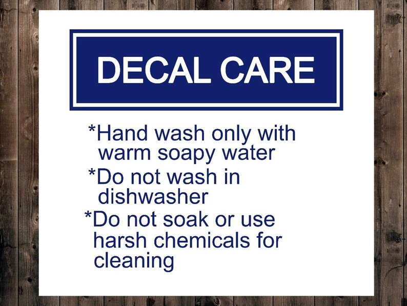 May include: A white sign with blue text that reads "DECAL CARE" and instructions for cleaning decals. The instructions are: "Hand wash only with warm soapy water", "Do not wash in dishwasher", and "Do not soak or use harsh chemicals for cleaning."