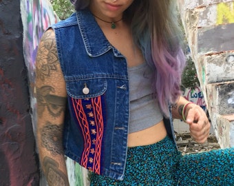 Reworked, sleeveless denim jacket