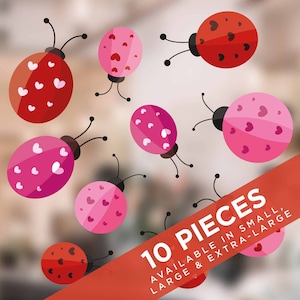 May include: Ten pink and red ladybug stickers with white hearts on a clear glass surface. The stickers are available in small, large, and extra-large sizes.