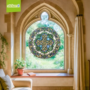 May include: A stained glass window sticker with a Celtic knot design in shades of blue, green, and gold. The sticker is round and placed in a large arched window. The window is framed by a stone wall. The text "stickers4" is in the top left corner.