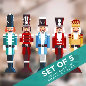 May include: Set of five colourful nutcracker figurines. Each nutcracker is a different design with a unique hat and facial features. The nutcrackers are standing in a row on a blurred background. The text "SET OF 5 AVAILABLE IN SMALL & LARGE" is on a teal blue banner.