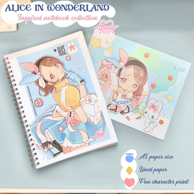 May include: Two Alice in Wonderland themed notebooks. The front cover of one notebook features a cartoon illustration of Alice in a blue and white dress with a yellow sweater. The other notebook features a cartoon illustration of Alice in a blue dress with a white apron. Both notebooks are A5 size and have lined paper. The notebooks are available with a free character print.