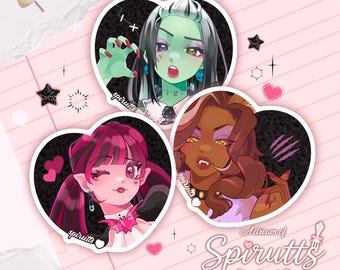 May include: Three heart-shaped stickers featuring cartoon illustrations of Monster High characters. The stickers have a black background and white borders. The artwork includes a green-skinned character, a character with pink hair, and a character with brown hair. The text "A dream of Spirutt's Artwork and Store" is also visible.