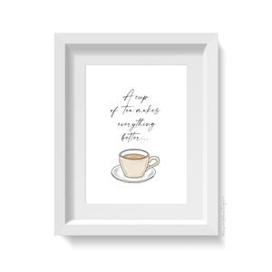 May include: A white framed print with the text "A cup of tea makes everything better..." and a hand-drawn illustration of a cup of tea on a saucer.
