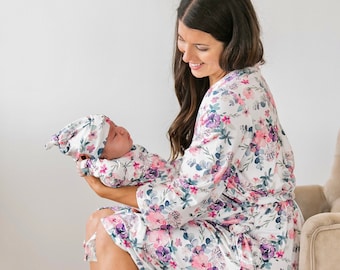 matching hospital gown and baby girl