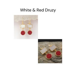May include: Gold-coloured earrings featuring white rectangular tops and red, round bottoms. The earrings are labelled "White & Red Druzy". The earrings are displayed on a neutral background.