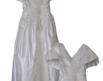 Impresionante vestido de novia y velo.