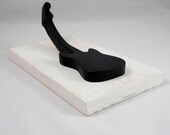 Fender Stratocaster Guitar stand on wood