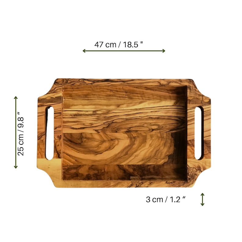 May include: A rectangular olive wood serving tray with two handles. The tray measures 18.5 inches long by 9.8 inches wide and 1.2 inches high.