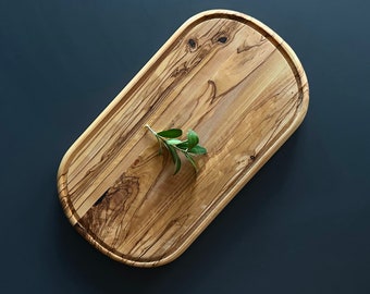 Ovale kaasplank van olijfhout