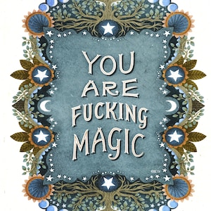 May include: An illustrated print with the words "YOU ARE FUCKING MAGIC" in white script on a teal background. The design is framed by a border of stars, moons, flowers, and tree branches. The artwork has a whimsical, mystical theme.