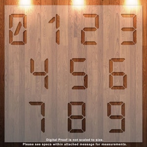 May include: A set of ten wood-burned digital numbers on a wood background. The numbers are 0 through 9. The text "Digital Proof is not scaled to size. Please see specs within attached message for measurements." is at the bottom of the image.