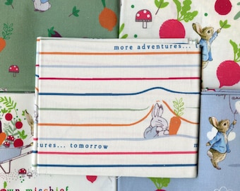 Tessuto di cotone Home Grown Hoppiness di PETER RABBIT. Tessuto trapuntato originale per neonati e bambini.