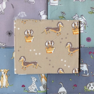 May include: A beige fabric with a repeating pattern of brown dachshunds in flower pots. The dachshunds are facing different directions. The fabric is surrounded by other fabrics with different patterns.