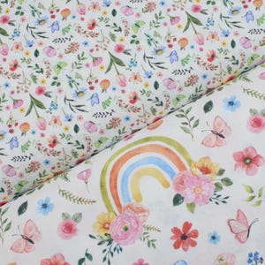 RAINBOW GARDEN AMORA cotton with dainty multicoloured flowers, rainbow and butterflies on white background. Rose & Hubble quilting fabric
