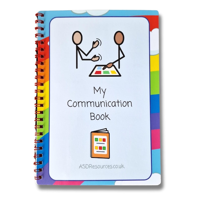 May include: A blue and white spiral bound book with a rainbow border. The cover features a cartoon image of two people using a communication board. The title is "My Communication Book" and the website "ASDRresources.co.uk" is printed below the title.