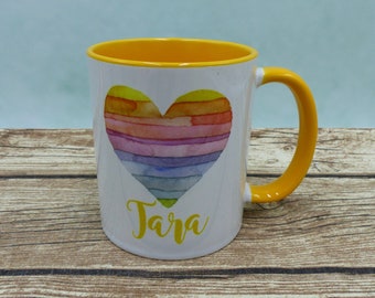 Tasse mit Namen Regenbogenherz in Wunschfarbe