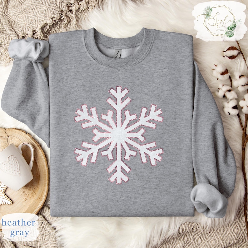 a sweater with a snowflake design on it