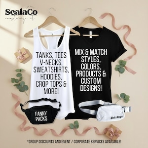 a variety of clothing items and accessories, including a white tank top, a black t-shirt, a black and white fanny pack, and a white tote bag, all displayed on wooden hangers. The text on the items reads "Mix & Match STYLES, COLORS, PRODUCTS & CUSTOM DESIGNS!" and "*GROUP DISCOUNTS AND EVENT / CORPORATE SERVICES AVAILABLE!".