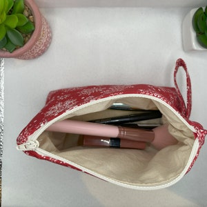 Snowflake cosmetic bag which can store make up, gadgets, jewellery etc..