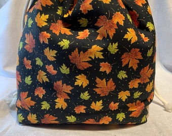 Large Drawstring bag, 11" x 9" in size with a 3 3/4" wide base, also has a zip pocket inside. ideal storage
