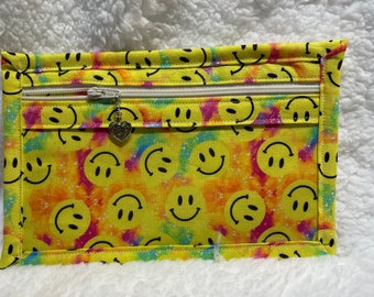 8&quot; x 5&quot; vinyl front fabric zipped bag made with a smiley face patterned cotton fabric, ideal to put all your bits and pieces in.