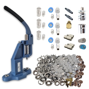 May include: A blue metal press with a black handle, various metal dies, and a collection of silver and bronze eyelets and snaps. The press is designed for setting eyelets and snaps in fabric or other materials.