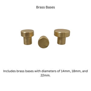 May include: Three brass bases in different sizes. The bases are round and have a smooth, polished finish. The bases are 14mm, 18mm, and 22mm in diameter.