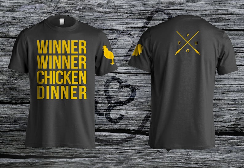 May include: Two gray t-shirts with yellow text and graphics. The first shirt says "Winner Winner Chicken Dinner" with a yellow chicken graphic. The second shirt has a yellow graphic of two crossed arrows with the letters "PUG" in between.