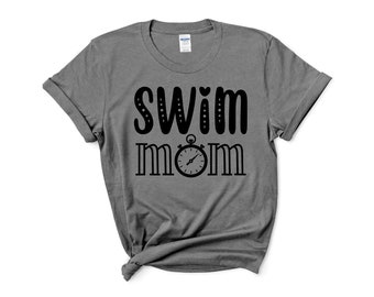 May include: Gray t-shirt with black text that reads "Swim Mom" and a black stopwatch graphic.