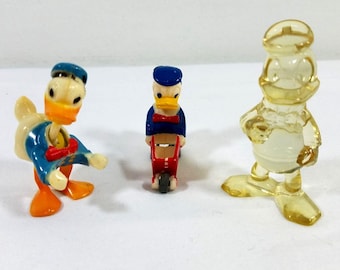 Disney Donald Duck vintage Spielzeug Figuren 1950er Jahre Wackelkopf 1970er Jahre Clear Lucite