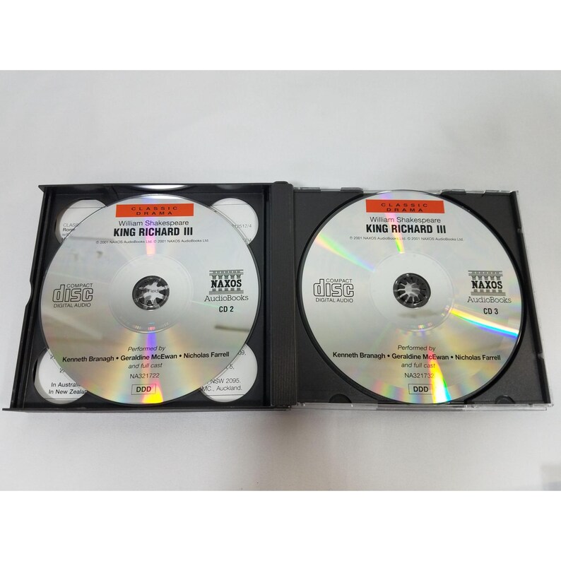 May include: Two open black CD cases with silver discs. The CDs are labeled "William Shakespeare King Richard III" and "Naxos AudioBooks." The cases are open, revealing the CDs and additional text. The CDs are labeled CD 2 and CD 3.
