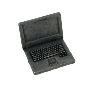 May include: A small, gray laptop with a detailed keyboard and screen. The miniature computer is made of a metallic material and is set against a white background. The laptop is open, showcasing its design.