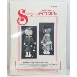 May include: Seeley's Dollmaker's Pattern No. CP606 for an authentic costume for a 21 inch PAN doll. The package features black and white photographs of a doll wearing a dress, jacket, hat, slip, camisole, pantaloons, mitts, purse, parasol, and boots.