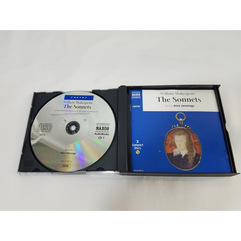 May include: Open black CD case with a silver disc and a blue cover. The disc reads "William Shakespeare The Sonnets" and "NAXOS Audiobooks CD 1". The blue cover features a portrait and the title "The Sonnets".