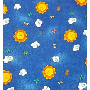 May include: A blue fabric with a repeating pattern of yellow smiling suns, white clouds, and colorful insects. The suns have orange rays and a smiling face. The insects include bees, butterflies, and ladybugs.