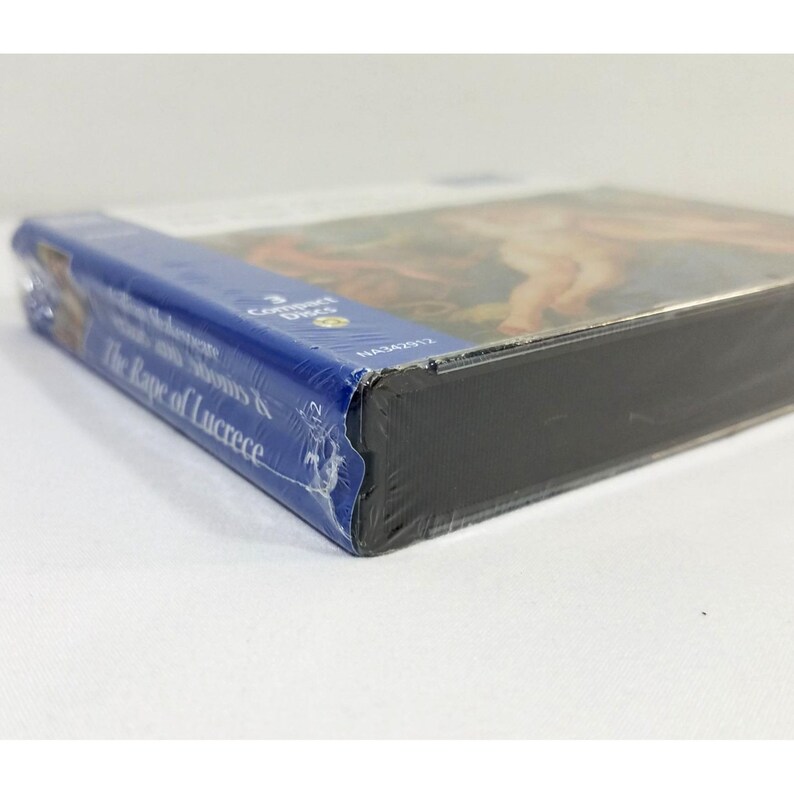 May include: A sealed CD case with a blue spine and the title "The Rape of Lucrece" visible. The cover art features a classical painting with nude figures. The case is wrapped in clear plastic.