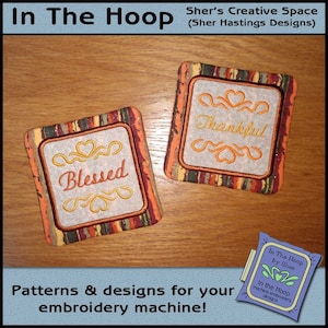May include: Two embroidered coasters with autumnal colors and designs. One coaster says "Blessed" and the other says "Thankful".