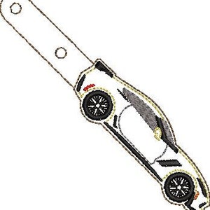May include: White car key chain with a black outline and black wheels. The car is facing to the right.