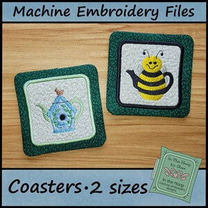May include: Two green square coasters with embroidered designs. One coaster features a blue teapot with a bird on the lid. The other coaster features a yellow and black bee with a teapot spout. The text "In The Hoop by Sher" and "In the Hoop machine embroidery designs" is visible on the image.