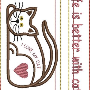 May include: Embroidered design featuring a brown cat curled up with a pink heart and the text "I love my cat". The background is white with a gold border and the text "Life is better with cats!" in pink.