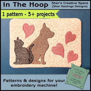 May include: Embroidery design pattern for a cat and dog with hearts. The design is on a beige fabric with a brown cat and a brown dog sitting next to each other. There are four red hearts around the animals. The text "In The Hoop" is on the image.