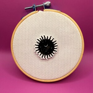 Sun Needle Minder
