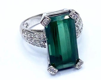 Diamond ring with 8 carat green tourmaline VS quality, white gold, appraised at 4,500.00 dollars