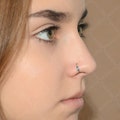 Implant Grade Titanium Nose Ring with Opal Stone - Nose Jewelry product logo